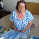 Възрастна жена се нуждае от рехабилитация за борба с дископатията